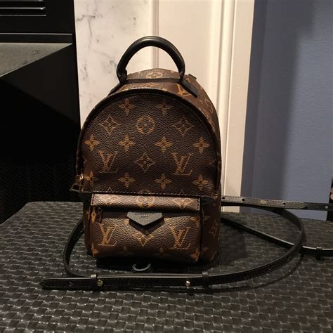 louis vuitton palm springs backpack mini .